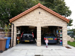 Cars in a Scottish garage.
